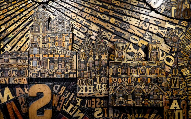 Wooden letterpress letters arranged as an artwork