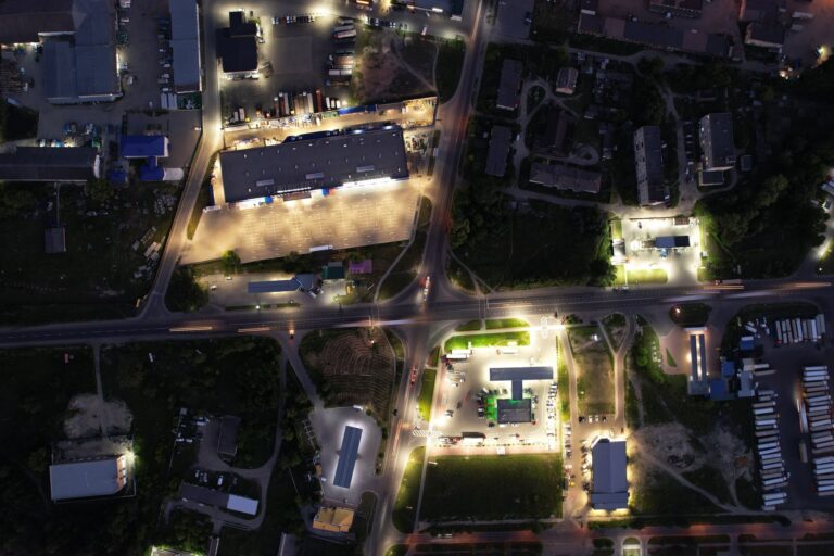 Aerial view of an illuminated city intersection at night